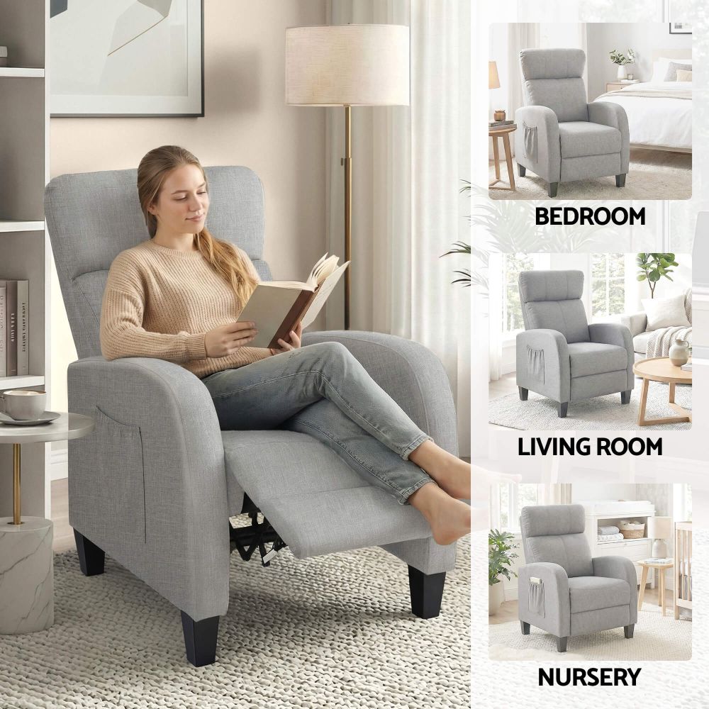 Woman reading a book in a grey Fabric RECLINER Compact Massage chair